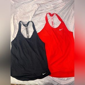 Nike womens XS running tank tops. 2 for 35